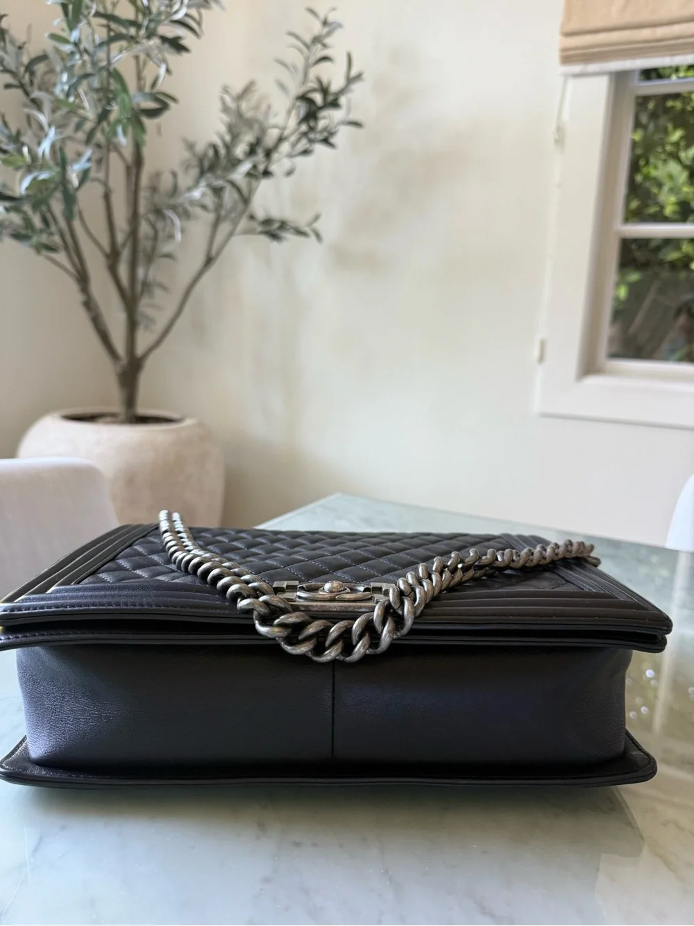 CHANEL Black Quilted Boy Flap Shoulder Bag with Silver Chain